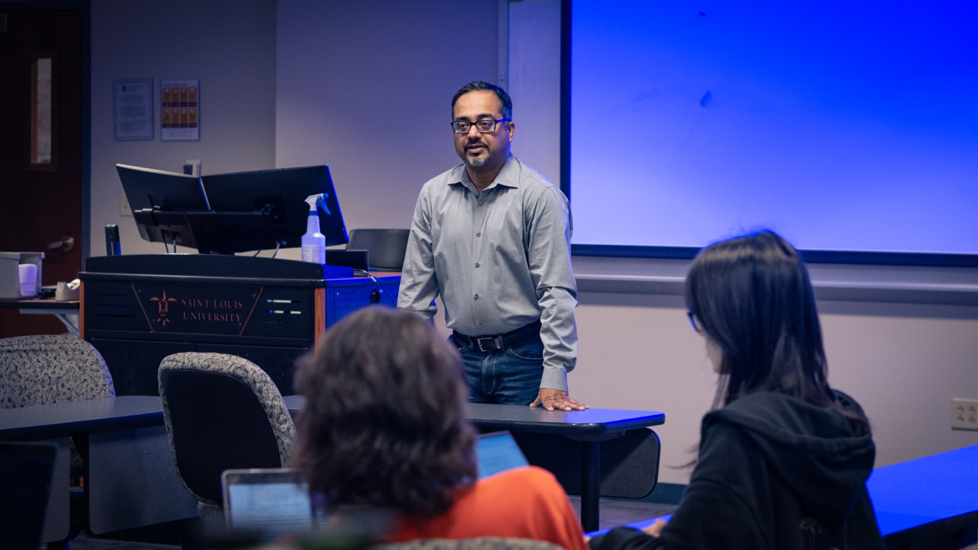 Abhimanyu Gupta teaching in a classroom at Saint Louis University